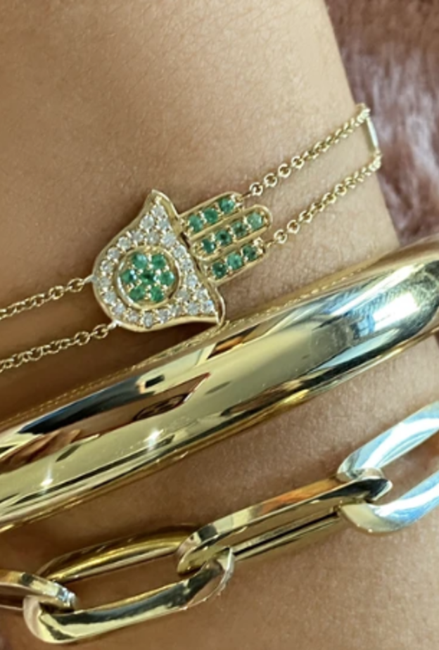 الصورة من موقع من Sig Ward jewelry