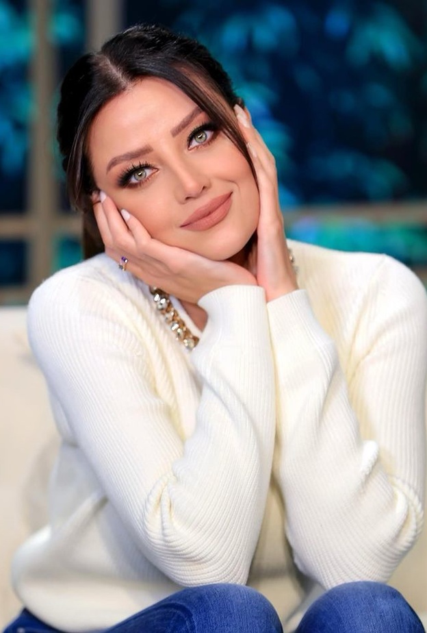 رضوى الشربيني بإطلالات جذابة باللّون الأبيض