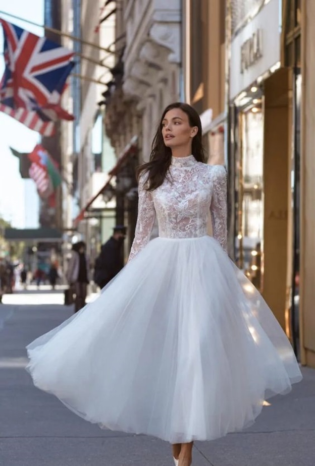 فساتين زفاف ميدي@wonaconcept