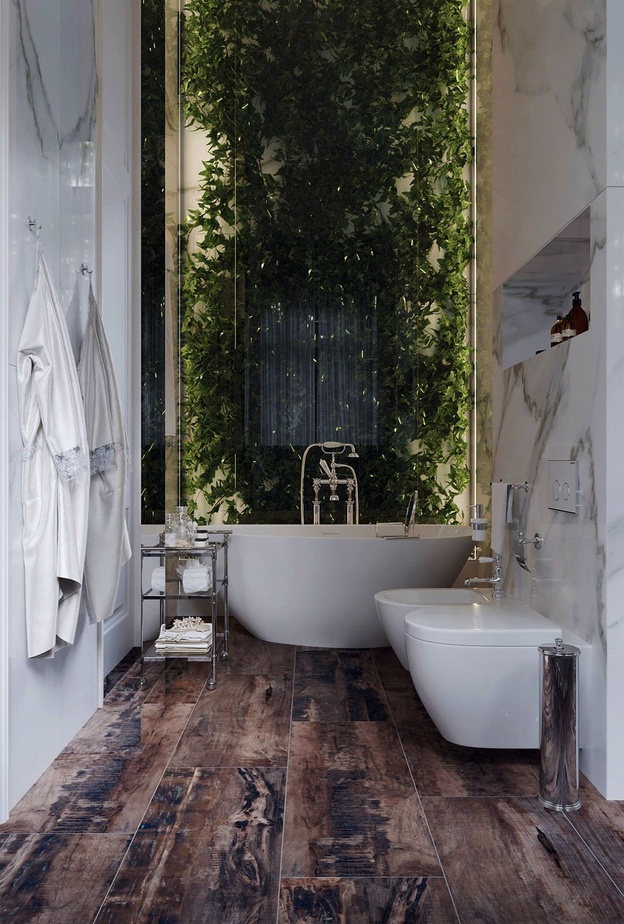 حمام مودرن يتميز بأرضية خشبية تمتزج بشكل رائع مع جدار النباتات