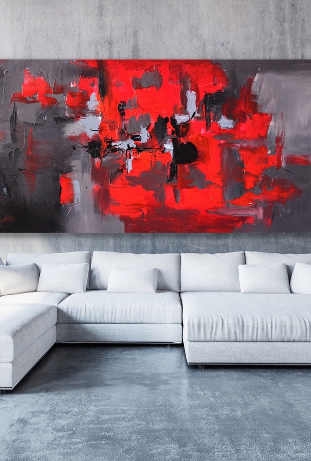 الأحمر يجذب الأنظار ويكسر روتين الألوان الحيادية في الديكور