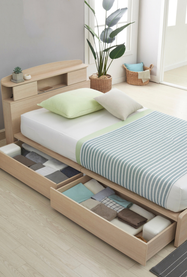لغرفة نوم منظمة وواسعة.. 6 أفكار تخزين في الأسرّة