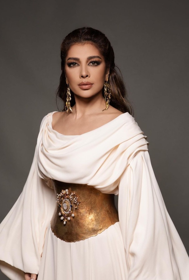 اصالة نصري بالفستان الابيض 