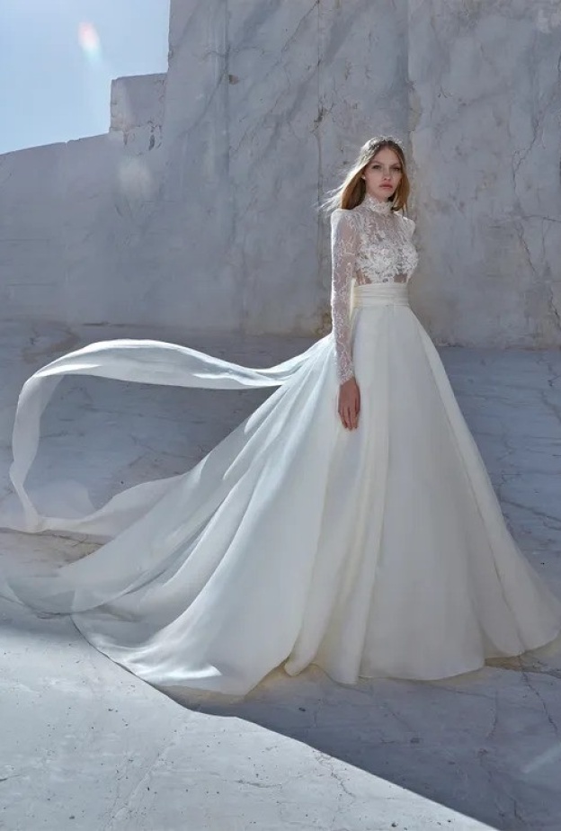 دليلك الكامل لاختيار أفضل أنواع أقمشة فستان الزفاف