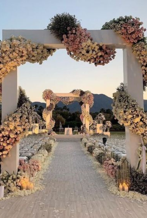 نظمي زفاف مثالي بلمسات رومانسية حالمة بين أحضان مغيب الشمس