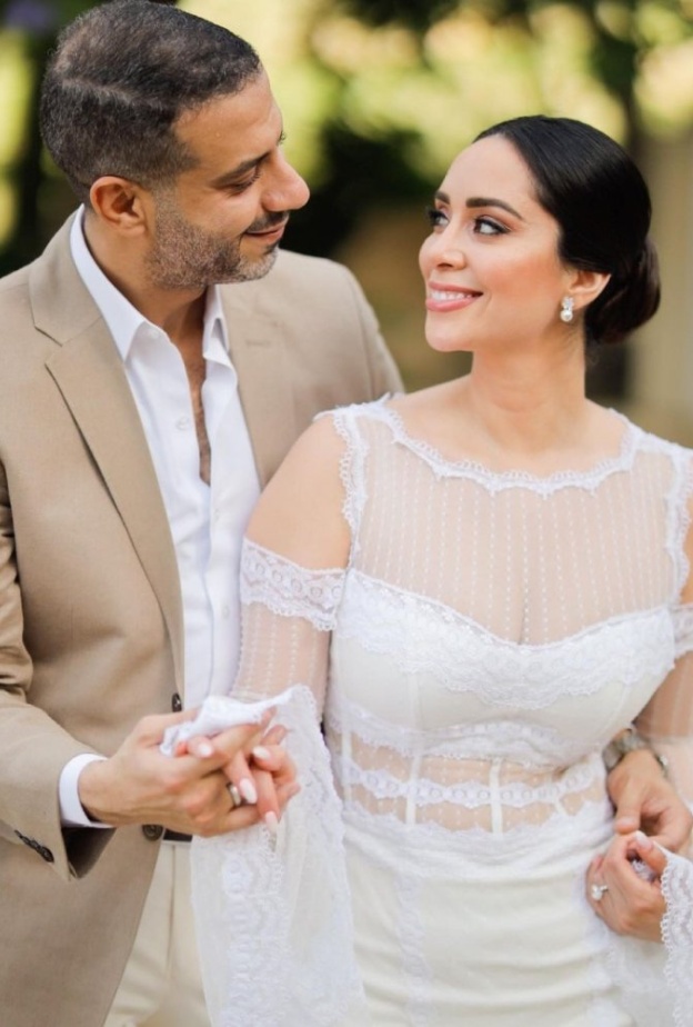 محمد فراج وبسنت شوقي خلال حفل عقد القران