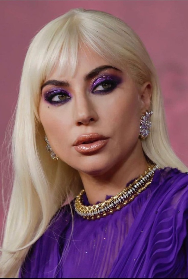 اطلالات ليدي غاغا الجمالية بتسريحات شعر مالسة- الصورة من وكالة  AFP