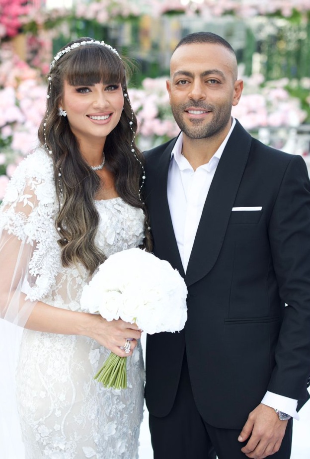 من إطلالة تامر عاشور وزوجته في الزفاف
