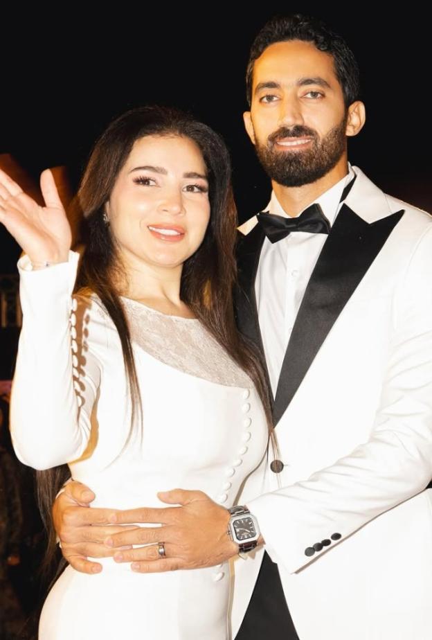 مي عز الدين وزوجها