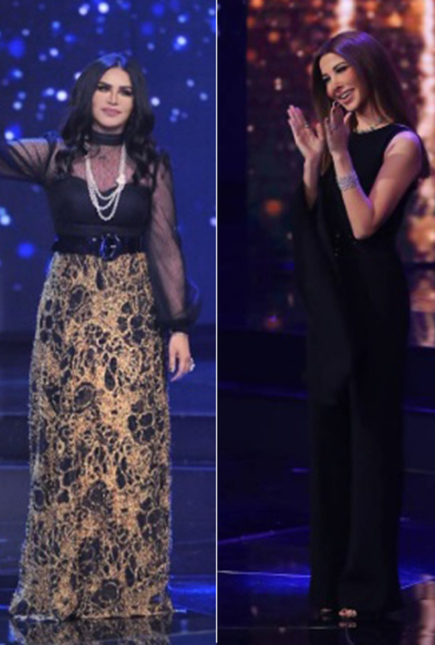 نانسي عجرم بموضة الجمبسوت الأسود‎ ‎مع الأكمام المكشوفة