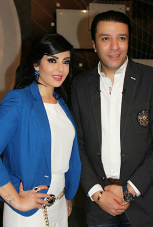 مصطفي كامل مع راغدة شلهوب فى 100 سؤال