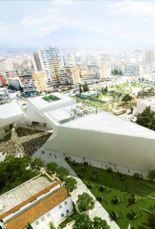 مسجد ألبانيا و التشكيلة الرائعة من الأحجام الثلاثة انفتاحه المقصود على نسيج المدينة