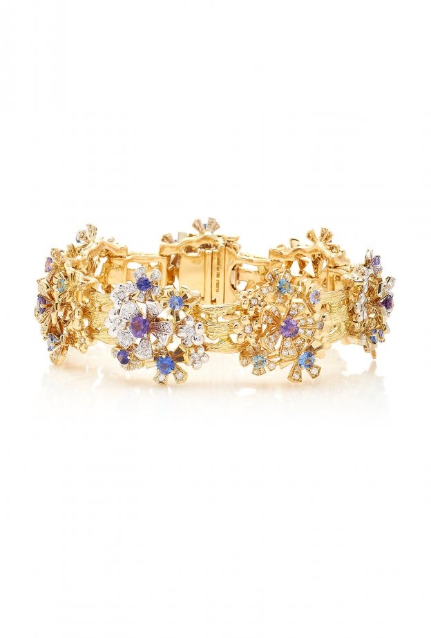 Mimi so سوار ذهب مستوحى من الورود ومزين بالأحجار الكلونة.