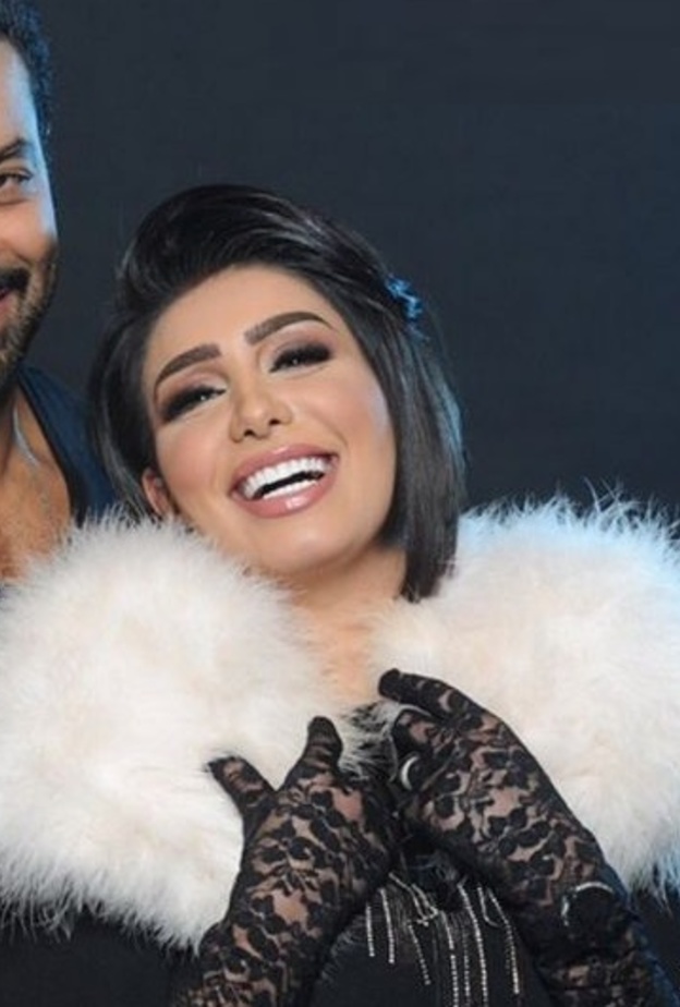 مع زوجها مع محمد الحداد