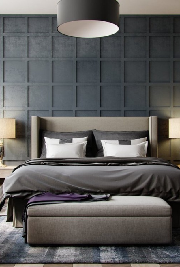 تصميم جذاب للجدار يجمع الرمادي بمسحات من اللون البرونزي