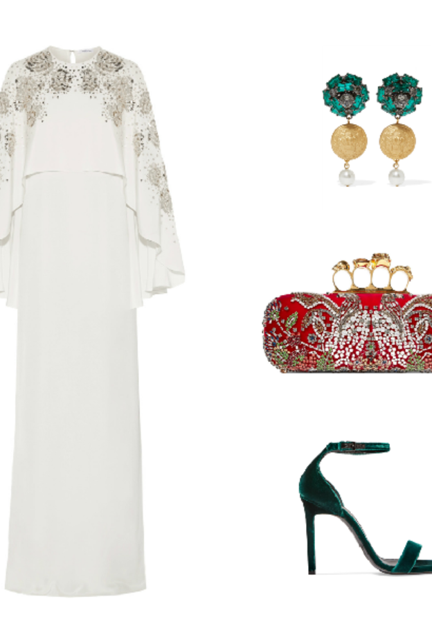 اطلالة مستوحاة من ألوان العمل الاماراتي في الجلابية البيضاء