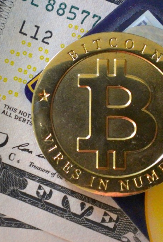 هجوم هاكر يغلق أكبر مواقع العملات الرقمية في العالم