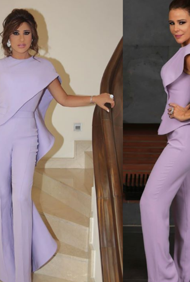 كرم اعتمدت ماكياجاً ناعماً وشعرا مرفوعاً