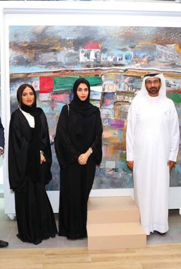 الامارات دبي الوطني يحتفي بذكرى زايد بلوحة فنية رائعة للفنانة فاطمة المزروعي