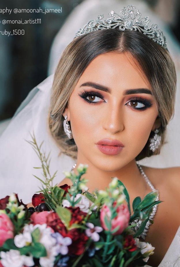 لقطة عروسين من المصورة آمنة جميل