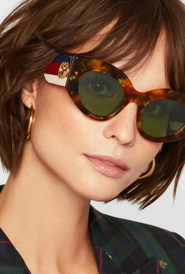 نظارة من غوتشي بالايطار الدائري مع الجلد