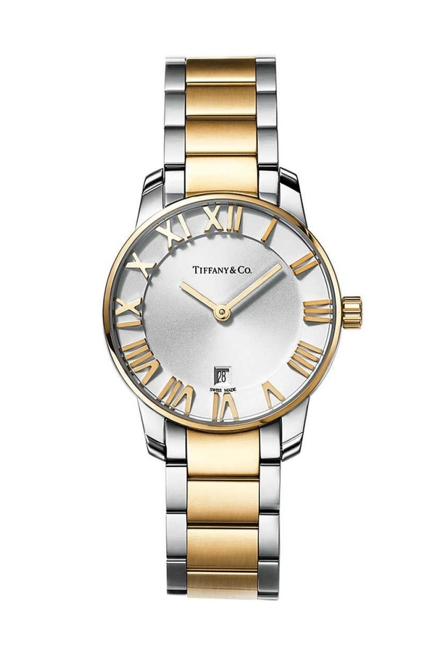 ساعة ديور من الذهب والفولاذ