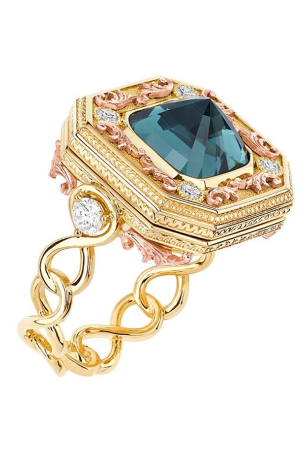خاتم ديور من الذهب والتوباز الأزرق
