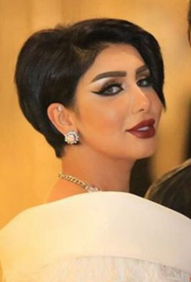 هنادي الكندري وزوجها