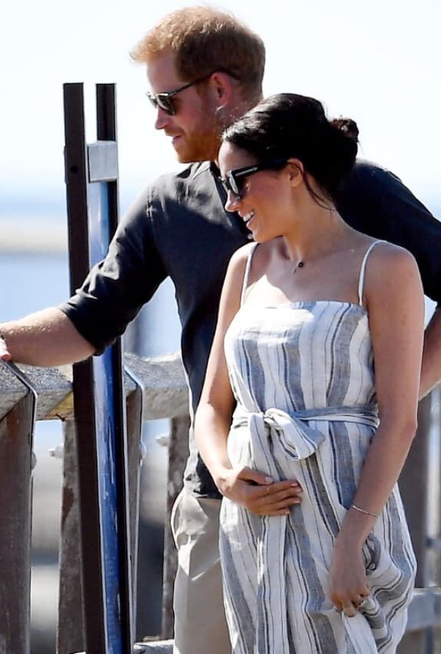 ميغان ماركل لا يمكنها اخفاء سعادتها بعد ظهور ملامح الحمل خلال زيارتها لأستراليا