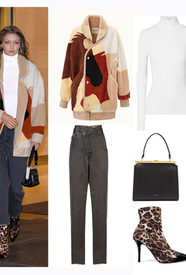 اطلالة خريفية ناعمة اختارتها جيجي حديد في الجينز الرمادي مع الحذاء بنقشة النمر