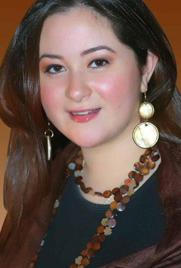 مي نور الشريف مع عائلتها