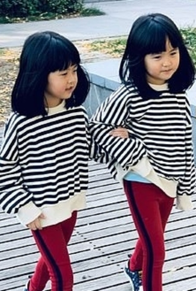 طفلتين صينيتين قد يتحقق حلمهما بمقابلة ملكة بريطانيا