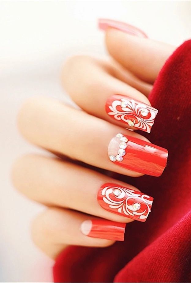 احدث اشكال و رسومات مناكير باللون الاحمر لعروس يوم الحب