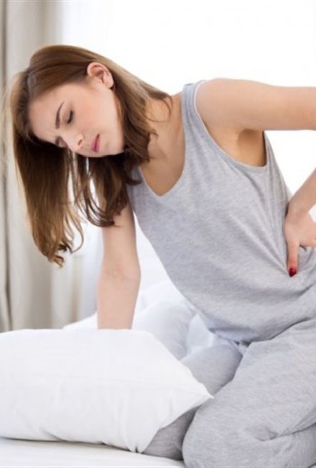 أسباب آلام الظهر بعد الولادة القيصرية وطرق تجنبها