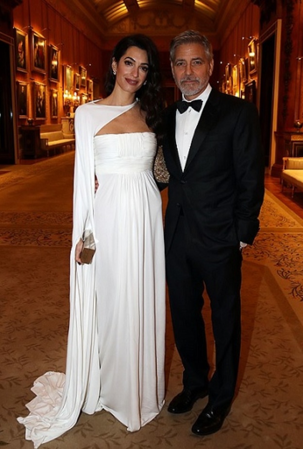 إطلالة أنيقة لأمل كلوني وزوجها جورج اثناء لقائهما الأمير تشارلز في لندن