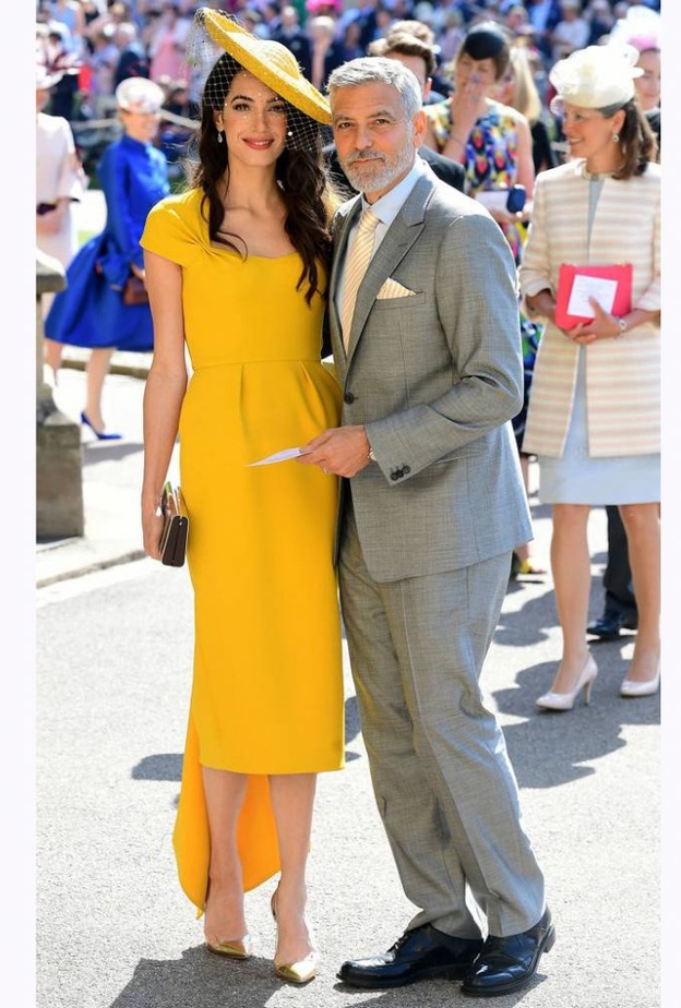 إطلالة أمل الاخيرة في قصر باكنغهام بفستان مستوحى من الأسلوب الإغريقي