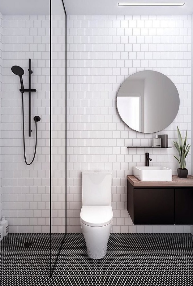 الأبيض ببساطته وبتصاميم جدران عصرية لديكور حمام صغير مودرن