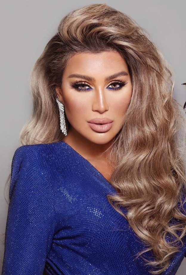 نادين نجيم تستعين بخصلات الشعر المستعارة