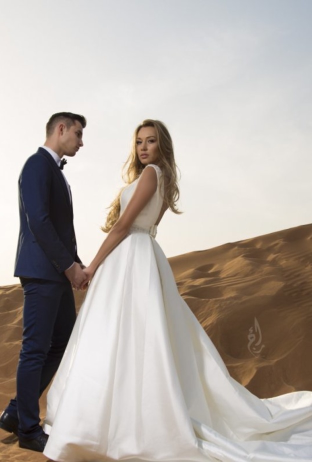 صورة عروسين بكاميرا المصورة السعودية رجاء عبدالله