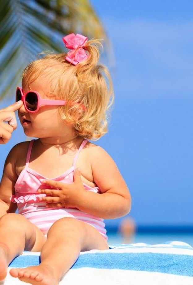 نصائح طبية لوقاية الأطفال من الإصابة بسرطان الجلد 