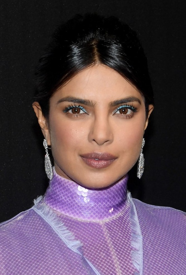 رسمات عيون ملونة وبنفسجية طبّقيها لشتاء 2020 من وحي Olivia Culpo