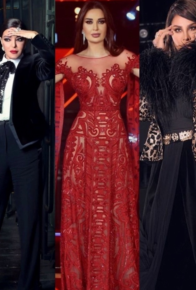 أضافت الى اللوك حزاماً ذهبياً حدد خصرها