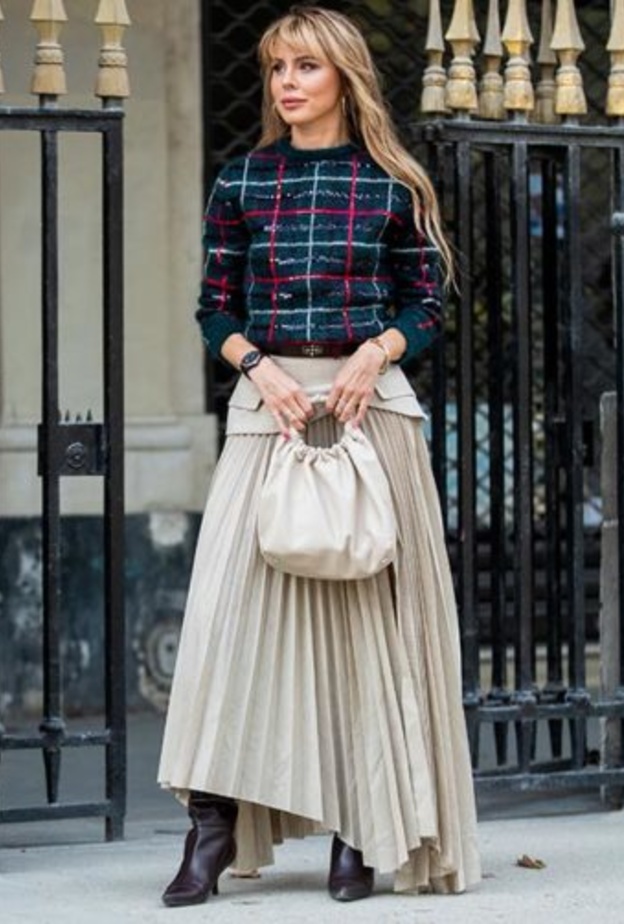 اعتمدي اطلالات تجمع بين الأناقة والعصرية في التنورة البليسيه