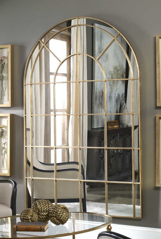 تصميم ناعم لمرآة تزيّن جدار المنزل