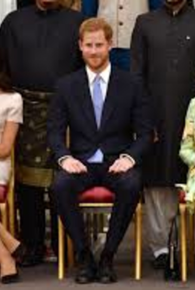 الملكة اليزابيث والأمير هاري وميغان