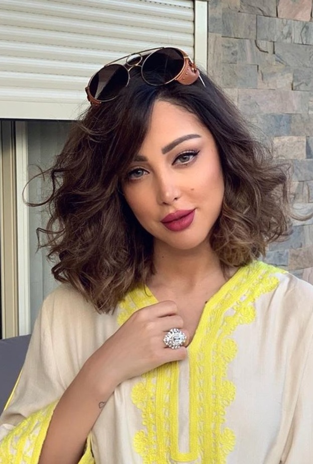 بسمة بوسيل وزوجها تامر حسني