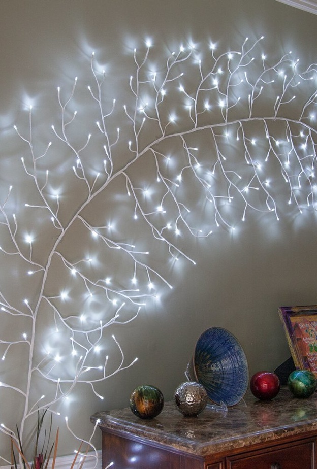 تصميم مصنوع من حبال الإنارة لديكورات حوائط غرف المعيشة