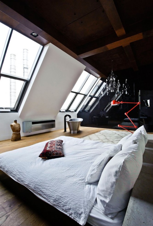 ديكور غرفة نوم مودرن تتميز بالجدران المائلة