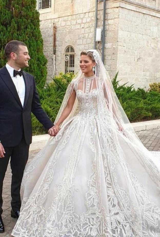 العروس بفستان ايلي صعب الذي جسد اعلى مستويات الفخامة