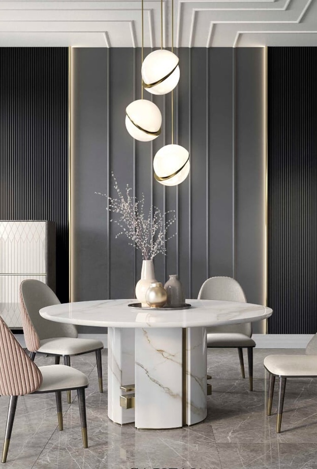 ‎⁨الرخام الفاخر في تصميم طاولة طعام دائرية الشكل بأسلوب عصري مميز